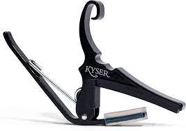 black acoustic guitar capo